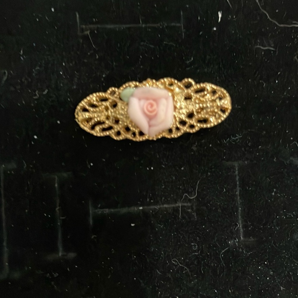 1928 brand gold tone Filigree Rose Brooch with pink porcelain rose.